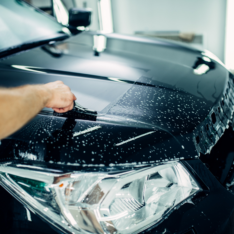 Specialist prepares car for protect against chips